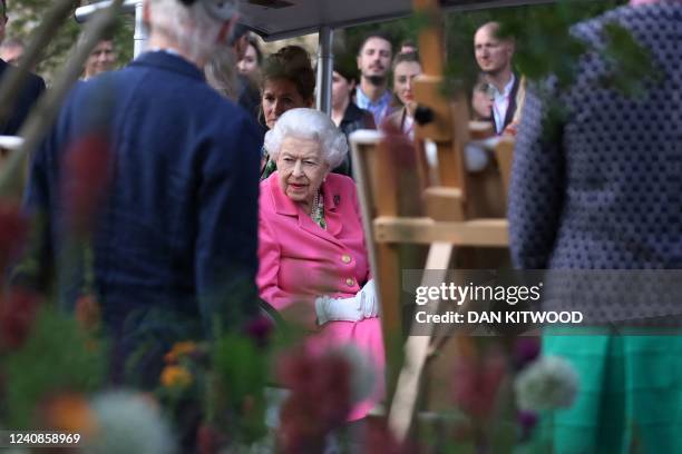 Britain's Queen Elizabeth II arrives for a tour of the 2022 RHS Chelsea Flower Show in London on May 23, 2022. The Chelsea flower show is held...