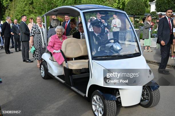 Queen Elizabeth II is given a tour by Keith Weed, President of the Royal Horticultural Society during a visit to The Chelsea Flower Show 2022 at the...