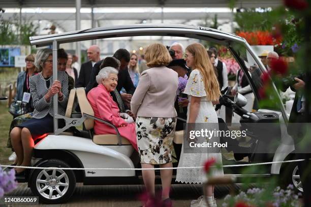 Queen Elizabeth II is given a tour by Keith Weed, President of the Royal Horticultural Society during a visit to The Chelsea Flower Show 2022 at the...