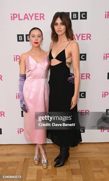 Bel Powley and Emma Appleton attend a photocall for new BBC drama "Everything I Know About Love" at BAFTA on May 23, 2022 in London, England.