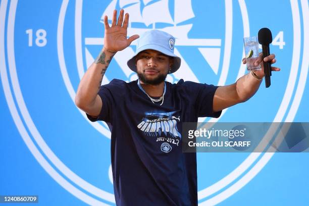 Manchester City's US goalkeeper Zack Steffen attends an event for fans with members of the Manchester City football team following an open-top bus...