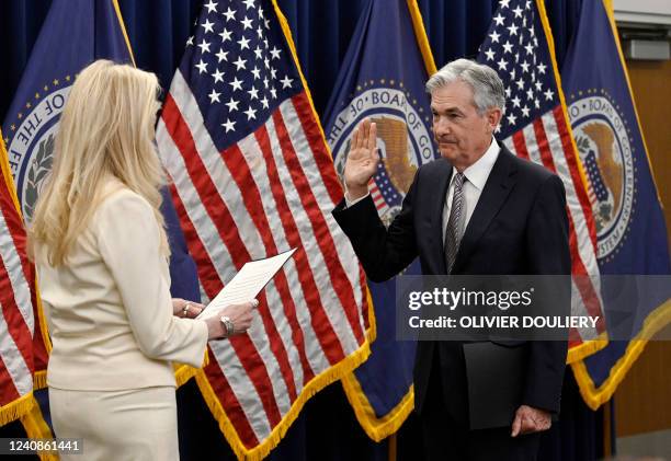 Jerome Powell takes the oath of office as he is sworn-in for his second term as Chair of the Board of Governors of the Federal Reserve System by Vice...