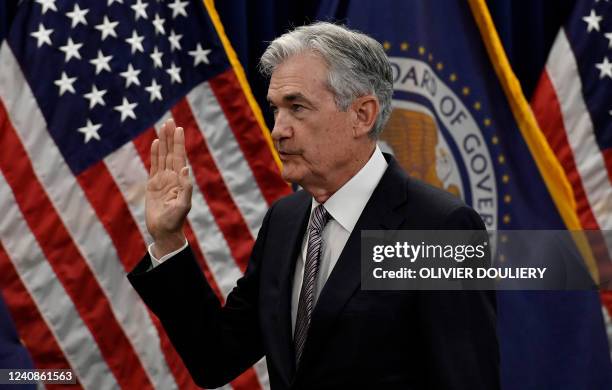 Jerome Powell takes the oath of office as he is sworn-in for his second term as Chair of the Board of Governors of the Federal Reserve System by Vice...