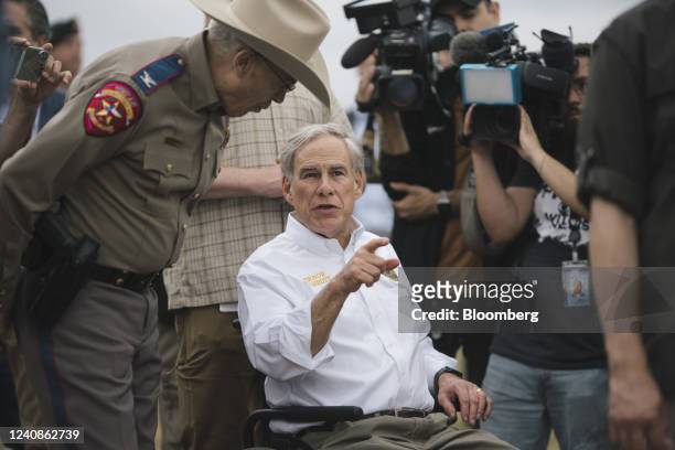 Greg Abbott, governor of Texas, tours the border between the US and Mexico along the Rio Grande River in Eagle Pass, Texas, US, on Monday, May 23,...