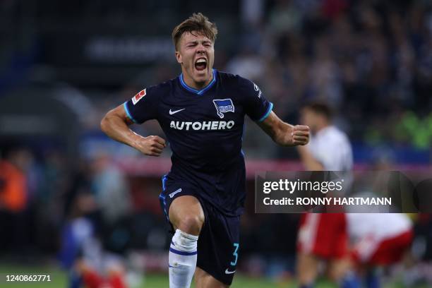 Hertha Berlin's Norwegian defender Fredrik Andre Bjorkan celebrates at the final whistle of the German Bundesliga Relegation Play-Off second-leg...