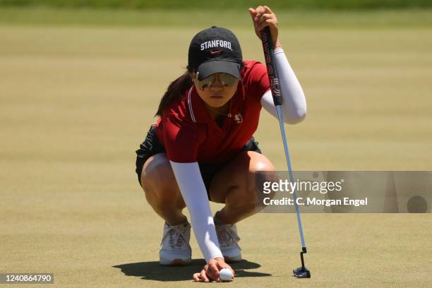 Rose Zhang of the Stanford Cardinal places her ball during the Division I Womens Golf Championship held at the Grayhawk Golf Club on May 23, 2022 in...