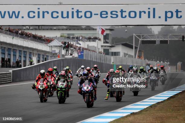 Riders compete during the Race 2 of the FIM Superbike World Championship Estoril Round at the Circuito Estoril in Cascais, Portugal on May 22, 2022.