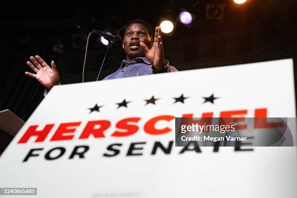 Heisman Trophy winner and Republican candidate for US Senate Herschel Walker speaks at a rally on May 23, 2022 in Athens, Georgia. Tomorrow is the...