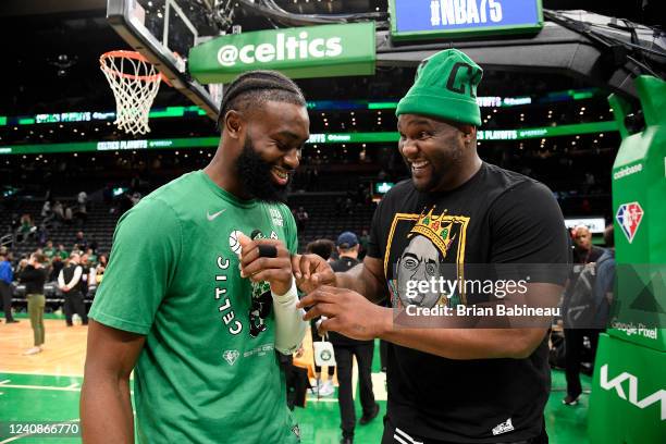 Jaylen Brown of the Boston Celtics shakes talks with Former NBA Player, Glen Davis after Game 4 of the 2022 NBA Playoffs Eastern Conference Finals on...