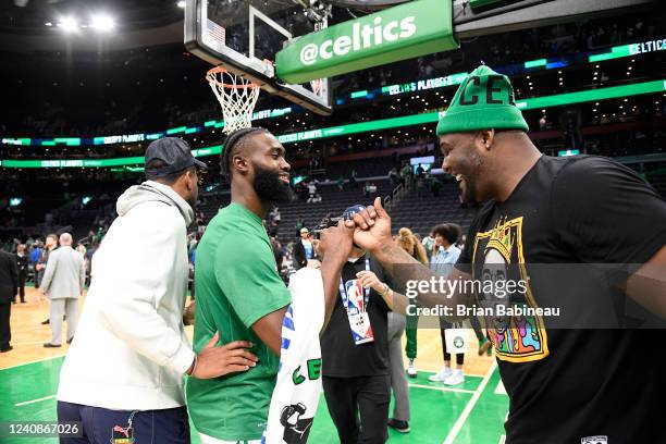 Jaylen Brown of the Boston Celtics shakes hands with Former NBA Player, Glen Davis after Game 4 of the 2022 NBA Playoffs Eastern Conference Finals on...