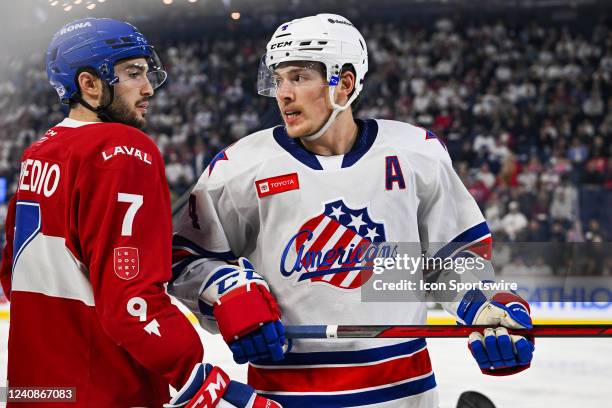 Rochester Americans defenceman Jimmy Schuldt has an argument with Laval Rocket defenceman Louie Belpedio during the game 2 of round 3 of the Calder...