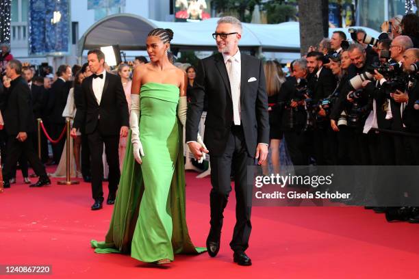 Tina Kunakey and Vincent Cassel attend the screening of "Crimes Of The Future" during the 75th annual Cannes film festival at Palais des Festivals on...