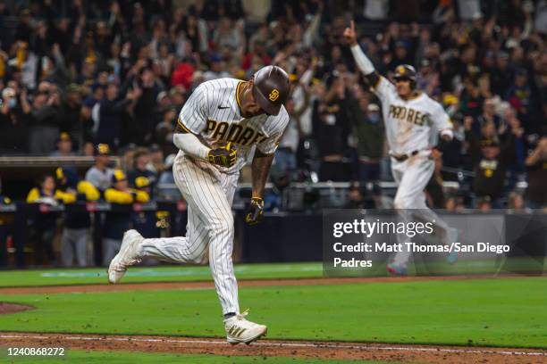 Jose Azocar of the San Diego Padres celebrates after a walk-off victory against the Milwaukee Brewers at Petco Park on May 23, 2022 in San Diego,...