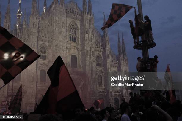 Milan fans celebrating Serie A title in Duomo square, in Milan, Italy, on May 23, 2022.