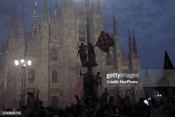 Milan fans celebrating Serie A title in Duomo square, in Milan, Italy, on May 23, 2022.