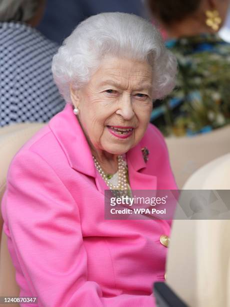 Queen Elizabeth II visits The Chelsea Flower Show 2022 at the Royal Hospital Chelsea on May 23, 2022 in London, England. The Chelsea Flower Show...
