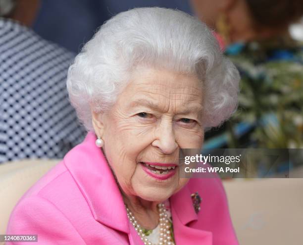 Queen Elizabeth II visits The Chelsea Flower Show 2022 at the Royal Hospital Chelsea on May 23, 2022 in London, England. The Chelsea Flower Show...