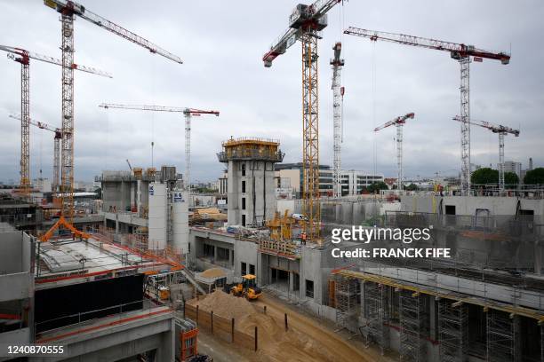 View of the Olympic village construction site in Saint-Denis, north of Paris, on May 23, 2022. The Olympic village, the main structure built for the...