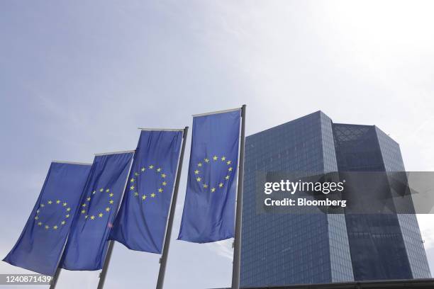 Flags of the European Union outside the headquarters of the European Central Bank in Frankfurt, Germany, on Monday, May 23, 2022. While ECB policy...