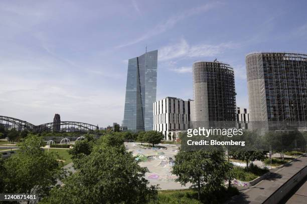 The European Central Bank headquarters, center, beyond buildings under construction near a skate park in Frankfurt, Germany, on Monday, May 23, 2022....