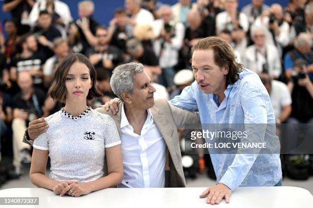 Algerian-French actress Lyna Khoudri, director Rachid Bouchareb and French actor Reda Kateb pose during a photocall for the film "Nos Frangins " at...