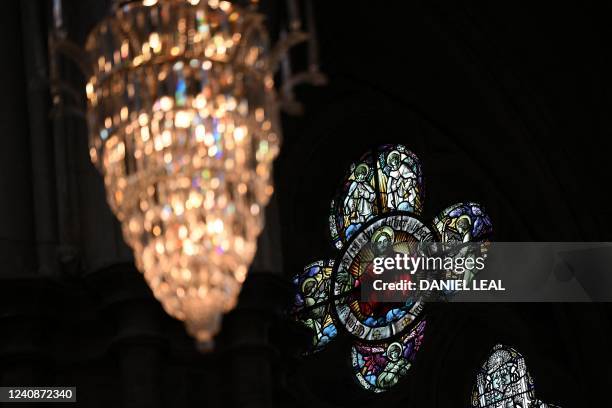 Stained glass window featuring a depiction of Jesus Christ is pictured at Westminster Abbey in London on May 24 ahead of the Order of the Bath...