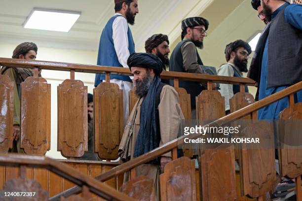 Taliban's acting first deputy prime minister Abdul Ghani Baradar arrives for a press conference in Kabul on May 24, 2022. - A United Arab Emirates...