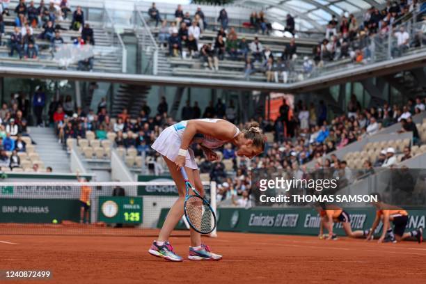 Czech Republic's Karolina Pliskova reacts as she plays against France's Tessah Andrianjafitrimo during their women's singles match on day three of...