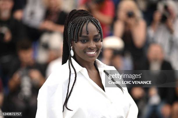 French actress Aissa Maiga smiles during a photocall for the "Adami" at the 75th edition of the Cannes Film Festival in Cannes, southern France, on...