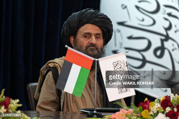 Taliban's acting first deputy prime minister Abdul Ghani Baradar attends a press conference in Kabul on May 24, 2022. - A United Arab Emirates...