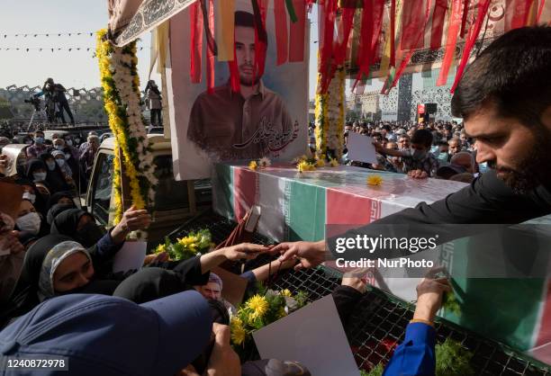 Pickup truck carries the coffin containing the body of the Islamic Revolutionary Guard Corps' colonel, Sayyad Khodai, during Khodais funeral in...