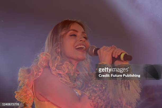 Singer María Fernanda Alvo Díaz of La Sonora Santanera performs on stage during a concert offered for mothers as part of the Mother's Day...