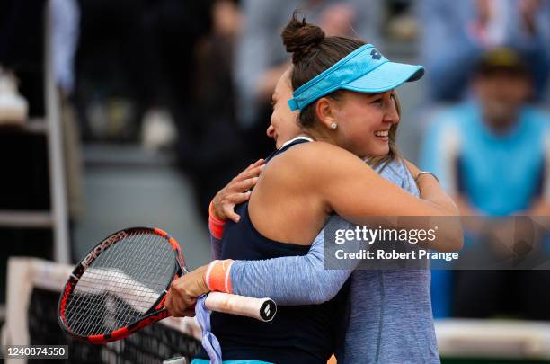 Kamilla Rakhimova of Russia and Aleksandra Krunic of Serbia embrace at the net after their first round match on Day 3 at Roland Garros on May 24,...