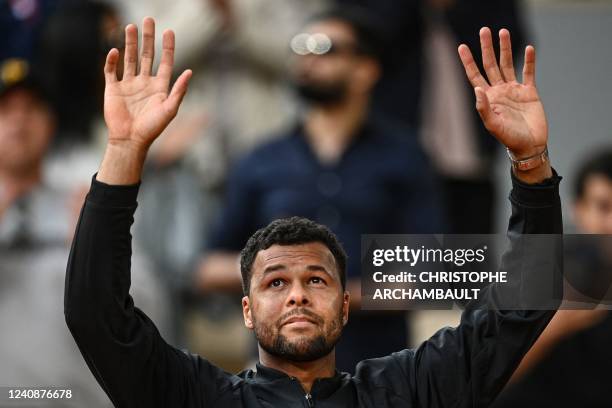 France's Jo-Wilfried Tsonga reacts after losing against Norway's Casper Ruud at the end of their men's singles match on day three of the...