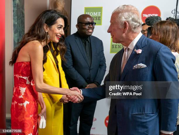 Prince Charles, Prince of Wales greets Amal Clooney at The Prince's Trust TK Maxx And Homesense Awards 2022 at Theatre Royal Drury Lane on May 24,...