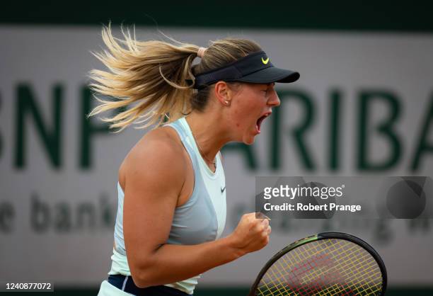 Marta Kostyuk of Ukraine in action against Mayar Sherif of Egypt in her first round match on Day 3 at Roland Garros on May 24, 2022 in Paris, France
