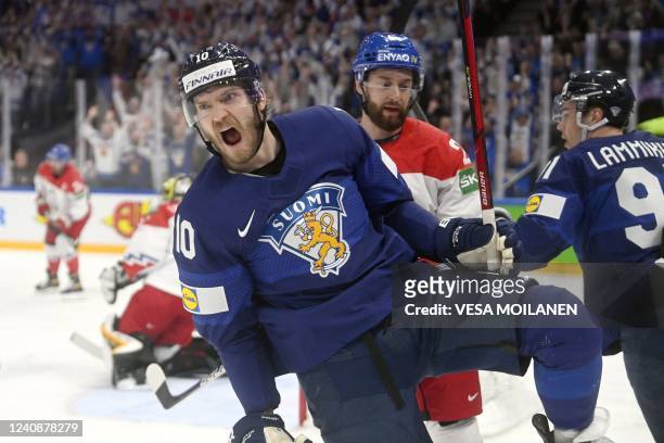 Finland's forward Joel Armia celebrates scoring the opening goal during the IIHF Ice Hockey World Championships preliminary round Group B match...