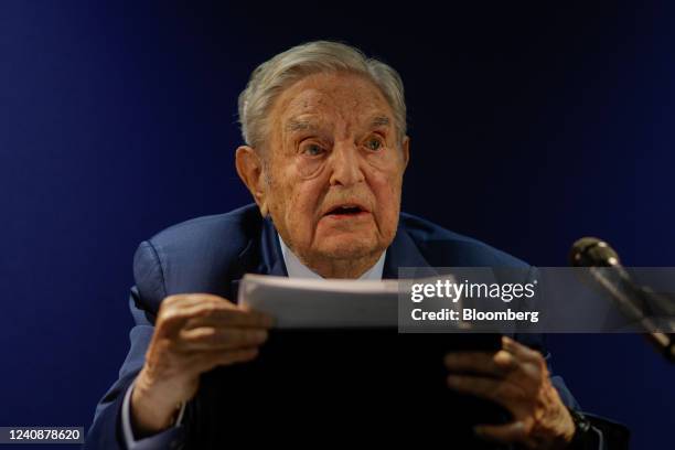 George Soros, billionaire and founder of Soros Fund Management LLC, speaks at an event on day two of the World Economic Forum in Davos, Switzerland,...