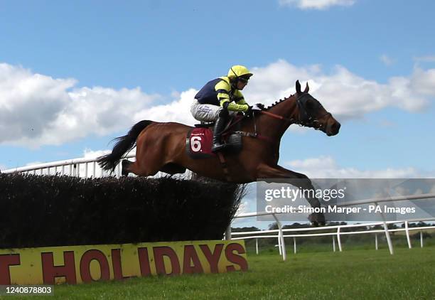 Fly Smart ridden by jockey Harry Bannister during the Stella Artois Handicap Chase at Bangor-On-Dee racecourse, Wrexham County Borough. Picture date:...