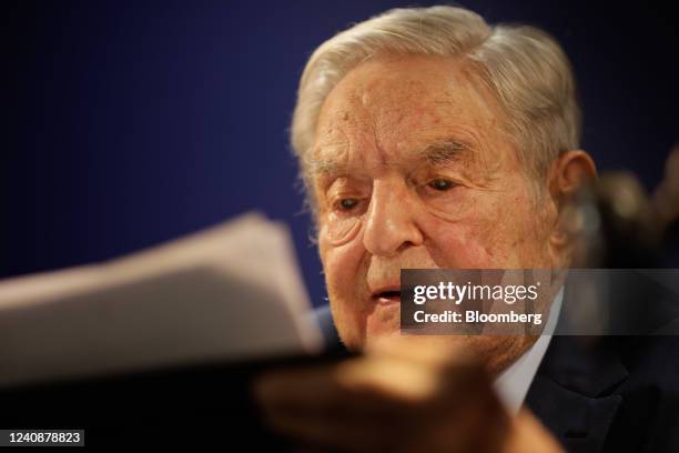 George Soros, billionaire and founder of Soros Fund Management LLC, speaks at an event on day two of the World Economic Forum in Davos, Switzerland,...