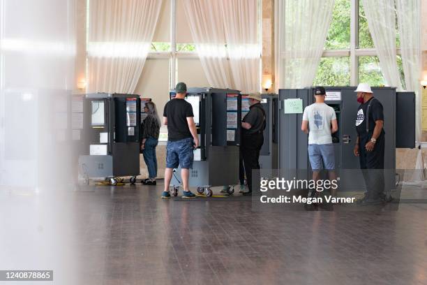 Voters visit polling places to cast their ballots in the 2022 Primary Election on May 24, 2022 in Atlanta, Georgia. Voters will be voting on U.S....