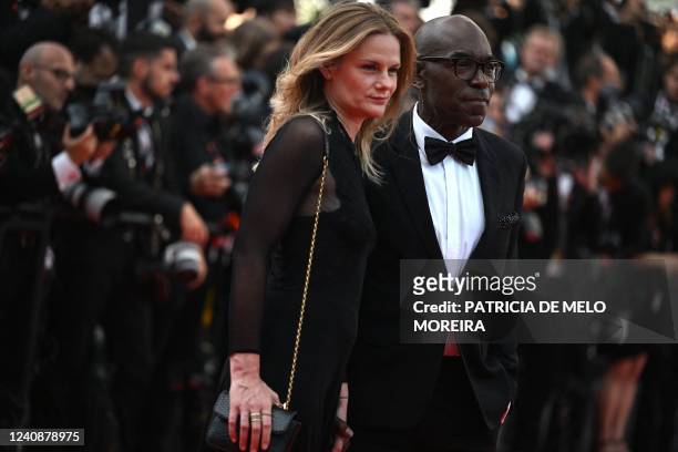 French actor and film director and member of the Camera d'or jury Lucien Jean-Baptiste and his wife French producer Aurelie Nollet arrive for the...