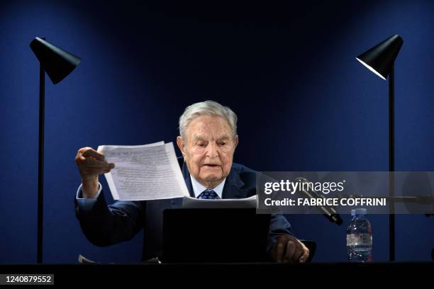 Hungarian-born US investor and philanthropist George Soros addresses the assembly on the sidelines of the World Economic Forum annual meeting in...