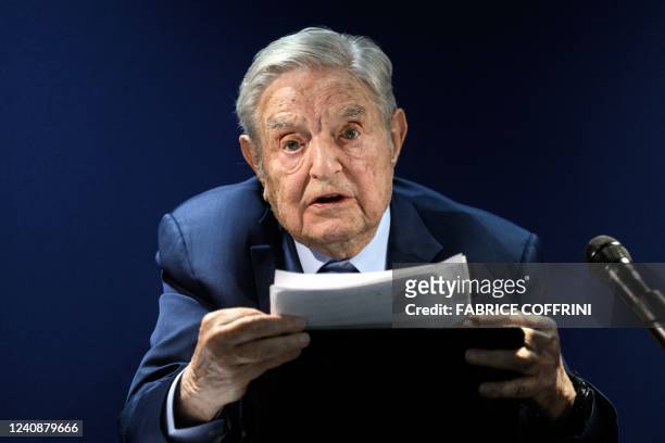 Hungarian-born US investor and philanthropist George Soros addresses the assembly on the sidelines of the World Economic Forum annual meeting in...