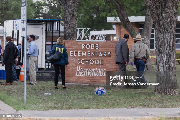 Law enforcement work the scene after a mass shooting at Robb Elementary School where 19 people, including 18 children, were killed on May 24, 2022 in...