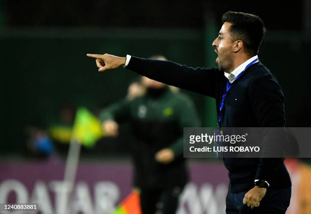 Chile's Antofagasta coach Diego Reveco gestures during the Copa Sudamericana group stage football match between Argentina's Defensa y Justicia and...