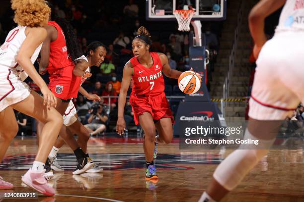 Kia Vaughn of the Atlanta Dream dribbles the ball during the game against the Washington Mystics on May 24, 2022 at Entertainment & Sports Arena in...