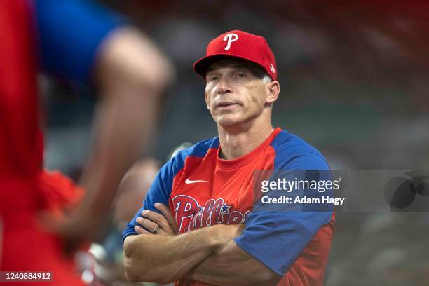 Joe Girardi of the Philadelphia Phillies in the dugout during the fourth inning against the Atlanta Braves at Truist Park on May 24, 2022 in Atlanta,...