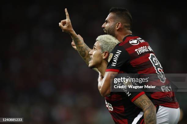 Pedro of Flamengo celebrates with teammate Thiago Maia after scoring the second goal of his team during the Copa CONMEBOL Libertadores 2022 match...