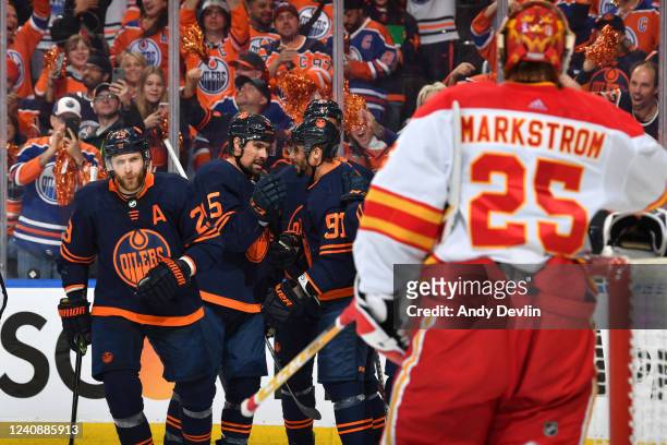 Leon Draisaitl, Cody Ceci, Evander Kane and Darnell Nurse of the Edmonton Oilers celebrate after a goal during Game Four of the Second Round of the...